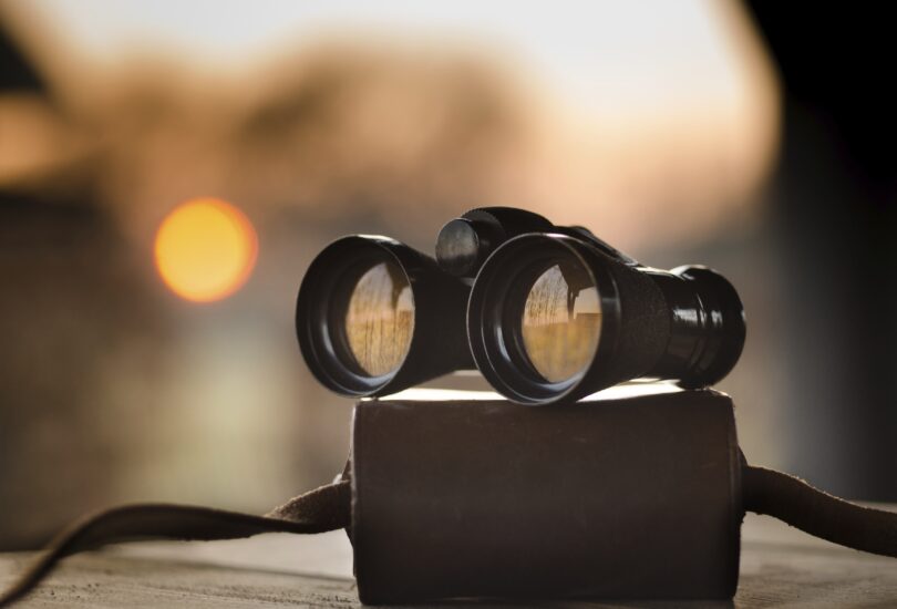 Photo of binoculars sitting on a box